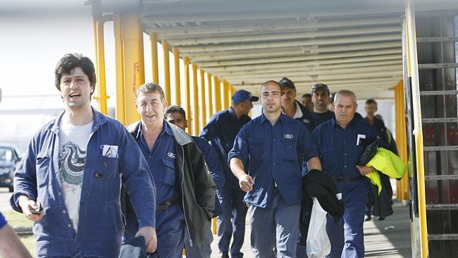 Workers leaving the Ford factory in Broadmeadows, Melbourne, after staff were told of fur