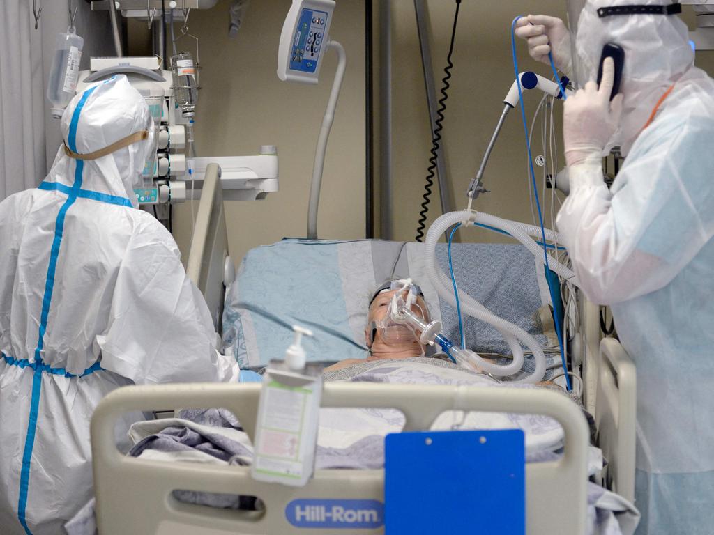 A patient infected with Covid-19 in Saint Petersburg. Russia has record deaths but more than half of the population says they won’t get vaccinated. Picture: AFP