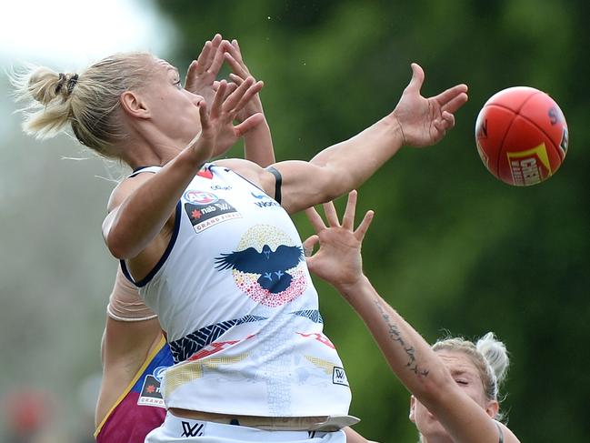 GOLD COAST, AUSTRALIA - March 25: Erin Phillips of the Crows compete for the mark during the 2017 AFL Womens Grand Final match between the Brisbane Lions and the Adelaide Crows on 25th March 2017 at Metricon Stadium on the Gold Coast, Australia. (Photo by Bradley Kanaris/News Corp )