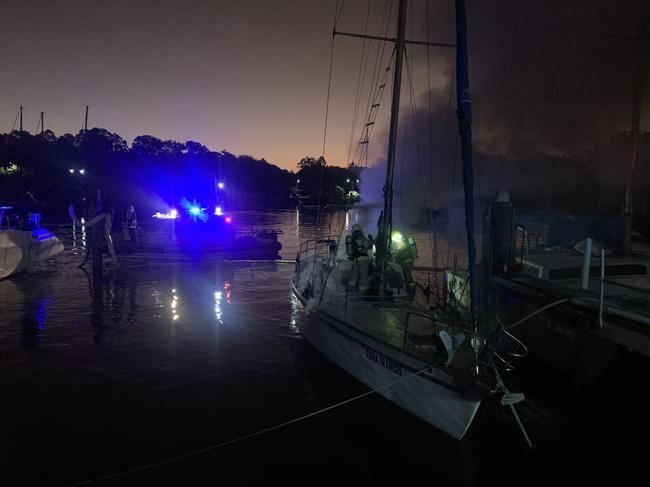 Multiple fire crews have extinguished a yacht fire on in the Brunswick Heads marina on Thursday, June 16.