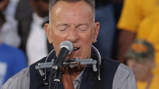 CLARKSTON, GEORGIA - OCTOBER 24: Musician Bruce Springsteen performs during a campaign event for Democratic presidential nominee, U.S. Vice President Kamala Harris with former President Barack Obama at the James R Hallford Stadium on October 24, 2024 in Clarkston, Georgia. Harris and Republican presidential nominee, former U.S. President Donald Trump, continue campaigning in battleground swing states before the November 5 election.   Alex Wong/Getty Images/AFP (Photo by ALEX WONG / GETTY IMAGES NORTH AMERICA / Getty Images via AFP)