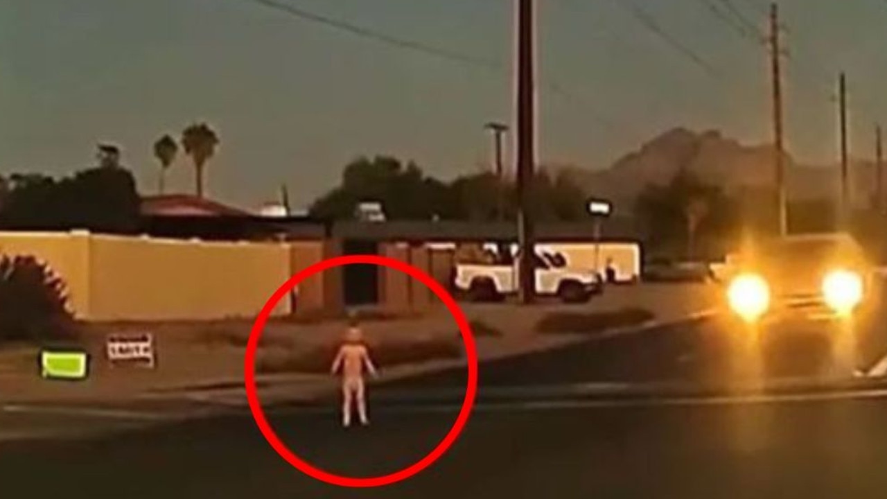 A toddler wandered onto a busy road in Arizona and was narrowly missed by passing cars. Picture: Arizona Family