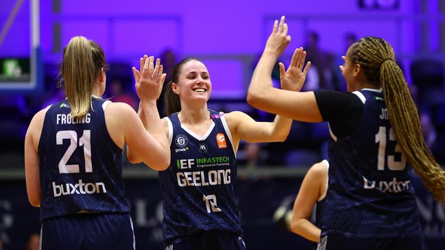 GEELONG, AUSTRALIA - NOVEMBER 07: Gemma Potter of United (C) celebrates victory during the round two WNBL match between Geelong United and Southside Flyers at The Geelong Arena on November 07, 2024 in Geelong, Australia. (Photo by Graham Denholm/Getty Images)