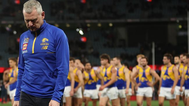 MELBOURNE, AUSTRALIA - AUGUST 05: Eagles coach Adam Simpson walks off after the Eagles were defeated by the Bombers during the round 21 AFL match between Essendon Bombers and West Coast Eagles at Marvel Stadium, on August 05, 2023, in Melbourne, Australia. (Photo by Robert Cianflone/Getty Images)