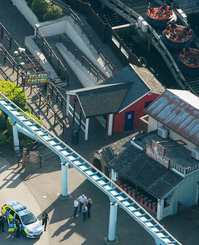 Police are seen at the entrance to the Splash Canyon ride at Drayton Manor theme park after the tragic accident. Picture: SWNS/Mega.