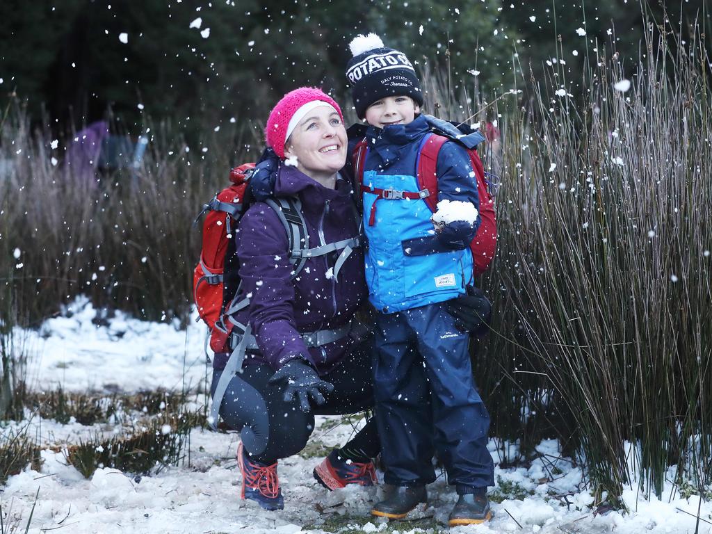 Kelly Jarvis with son Max Jarvis 6 who walked up to The Chalet from The Springs. Access to The Springs on kunanyi/Mount Wellington again after snowfall. Picture: Nikki Davis-Jones