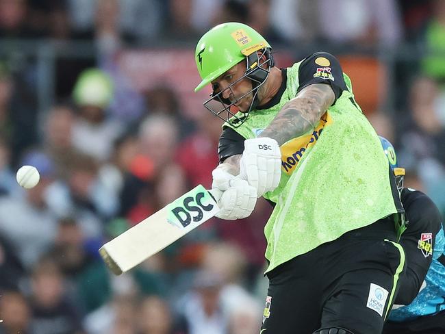 A near-capacity 11,173 crowd turned up at Manuka Oval to watch Alex Hales and the Thunder take on the Strikers. Picture: Getty Images