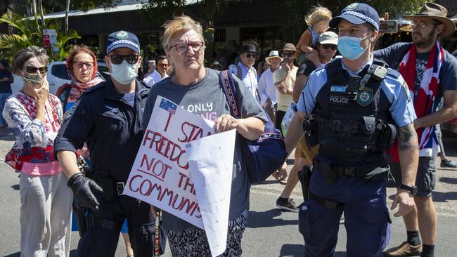 Joy Price taken away by police during a freedom protest on Saturday.