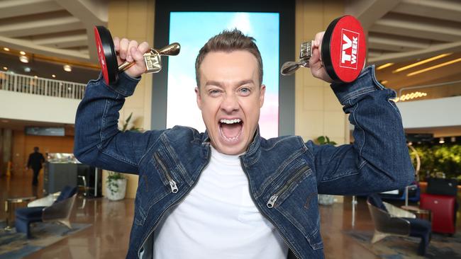 Grant Denyer with his Logies. Picture: Richard Gosling