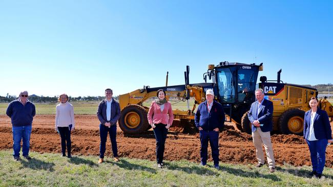 Queensland Premier Annastacia Palaszczuk (centre) at the site of a quarantine hub that will be built at Wellcamp Airport in Toowoomba picture also is Neill Wagner, CHO Jeannette Young, Deputy Premier Steven Miles, John Wagner, Joe Wagner and Health Minister Yvette D'Ath.