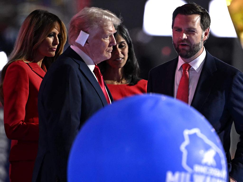 Trump chats with vice presidential running mate J.D. Vance. Picture: AFP