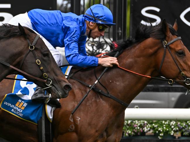 MELBOURNE, AUSTRALIA - SEPTEMBER 10: Blake Shinn riding Spacewalk winning Race 1, the Winning Edge Poseidon Stakes, but loses race on protest to Craig Newitt riding Buenos Noches (L) during Melbourne Racing at Flemington Racecourse on September 10, 2022 in Melbourne, Australia. (Photo by Vince Caligiuri/Getty Images)