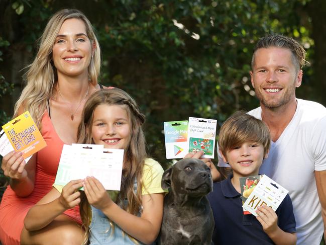 Lyndle and Spencer Richards with their children Ivy (7) and Saxon (5) at their house in Frenchs Forest.Picture: Christian Gilles