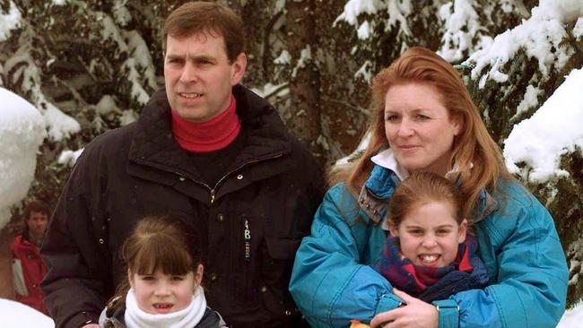 Prince Andrew and his former wife Sarah Ferguson, pose together with their daughters, Princesses Beatrice (R) and Eugenie, in the Swiss ski resort of Verbier in 1999.