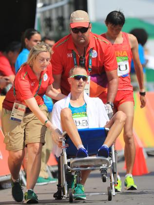 Jared Tallent wins silver, and collapses after the men's 50km walk. Picture: Alex Coppel