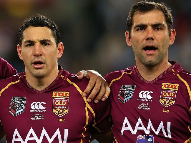 SYDNEY, AUSTRALIA - JULY 17:  (L-R) Greg Inglis, Billy Slater and Cameron Smith of the Maroons sings the national anthem before game three of the ARL State of Origin series between the New South Wales Blues and the Queensland Maroons at ANZ Stadium on July 17, 2013 in Sydney, Australia.  (Photo by Cameron Spencer/Getty Images)