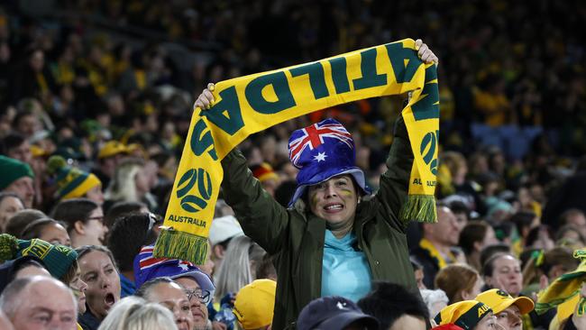 DAILY TELEGRAPH AUGUST 7, 2023. Fans celebrate an Australian goal at the FIFA Womens World Cup Australia V Denmark knockout game at Stadium Australia, Sydney Olympic Park. Picture: Jonathan Ng