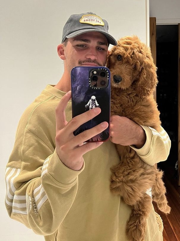 Cleary with his per cavoodle called Prince