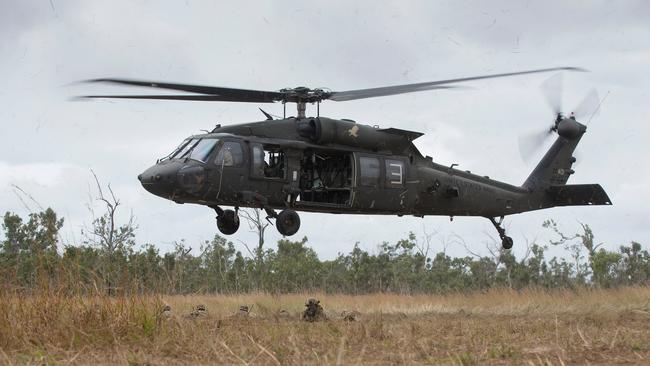 A UH-60 U.S. Army Black Hawk helicopter drops soldiers behind enemy lines as part of an air-mobility operation during Exercise Talisman Sabre. Picture: Department of Defence