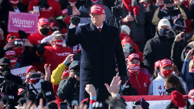 Donald Trump arrives for rally at Dubuque airport in Iowa on Monday. Picture: AFP