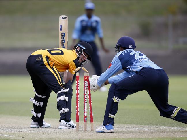 Blacktown's Jett Saxby looks at an attempted stumping by Parramatta keeper Adbith Boreddy in the Green Shield. Picture: John Apopleyard