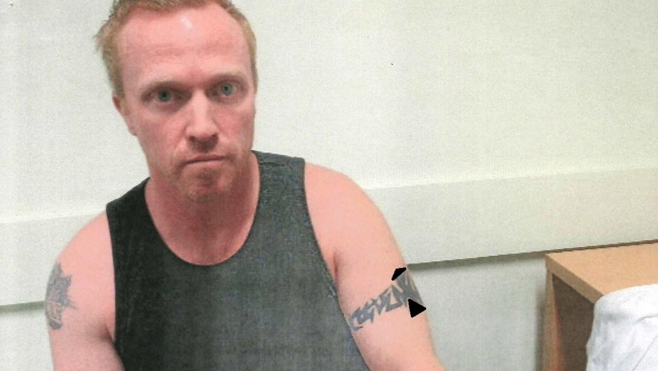 Court photo depicting the tattoo on the arm of Adrian Bayley after he was arrested for killing Jill Meagher.