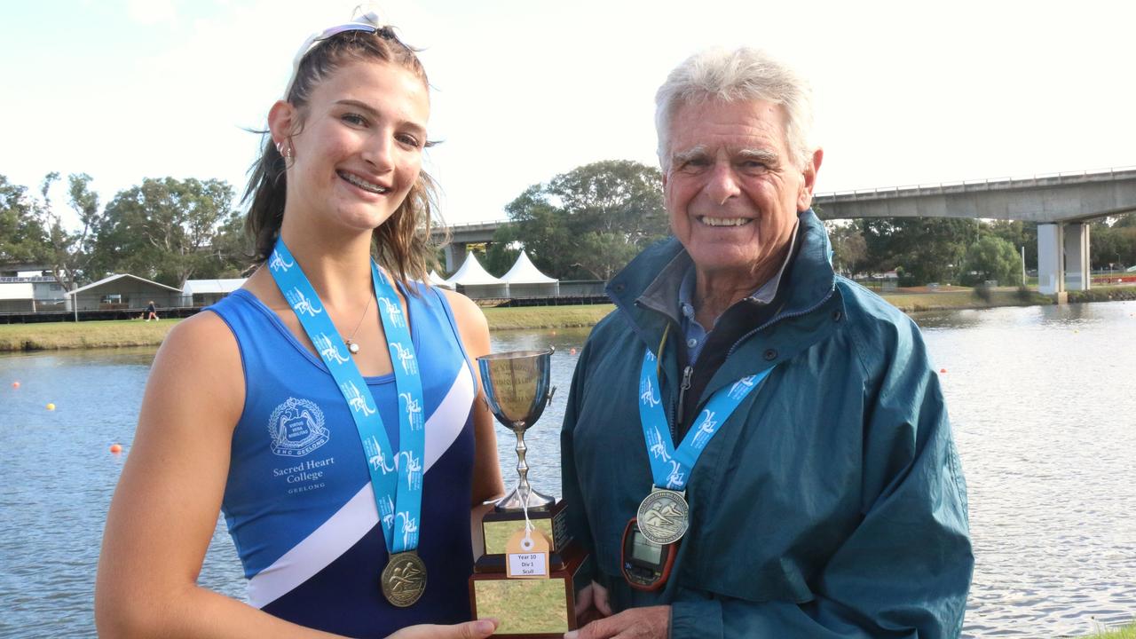 Sacred Heart College's Rio Smith with coach Jeff Watt celebrate a Head of the Schoolgirls win. Picture: Meg Saultry