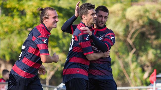 Epping City players celebrate a goal. Picture: Paul Seeley