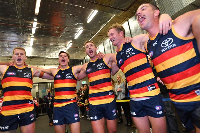 Crows players sings the club song after beating Fremantle in the Round 7 clash at the Adelaide Oval. Picture: David Mariuz/AAP