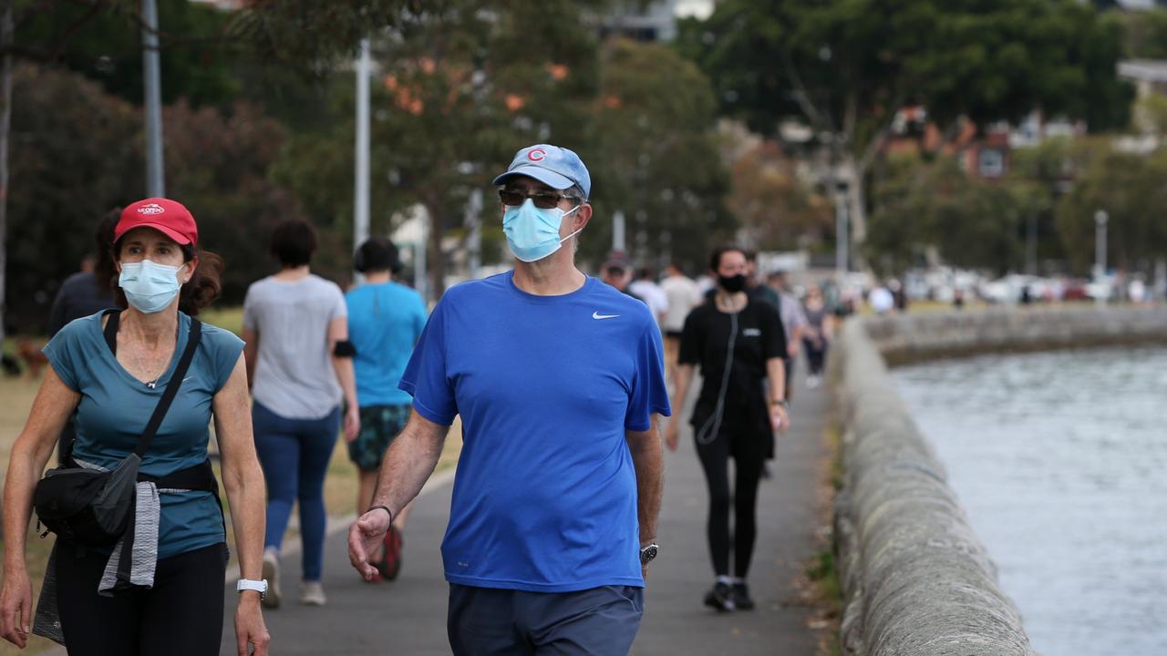 People in Greater Sydney are now required to wear masks when they go outdoors. Picture: Lisa Maree Williams/Getty Images.