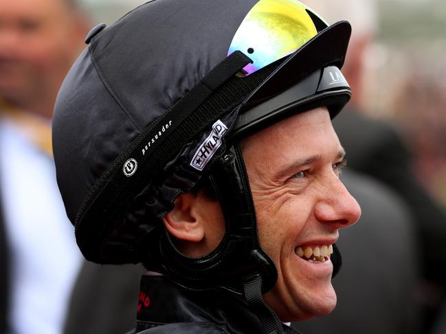 2013 Oaks Day Races at Flemington . Melbourne - November 7th, Picture by Colleen Petch. Race4 - G.H Mumm Stakes 1100m - Jockey Brett Prebble has a smile.