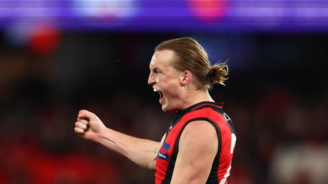 Mason Redman will be shaving off his locks for charity. Picture: Graham Denholm/AFL Photos via Getty Images.