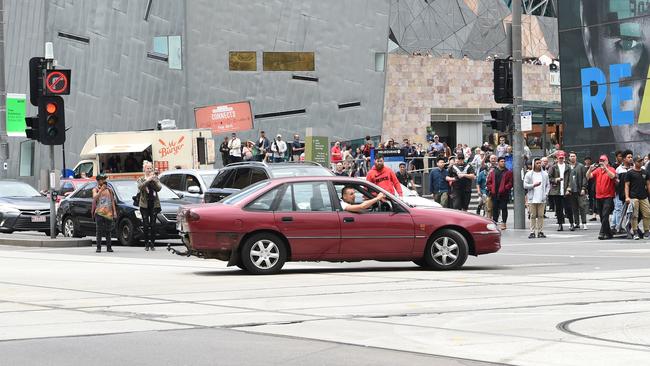 Gargasoulas at the intersection of Swanston and Flinders streets. Picture: Tony Gough