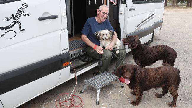 Bob Bramwell from Beaufort camped at the Wendouree relief centre with his dogs Alfie, Jacks, and Lilly. Picture: David Crosling