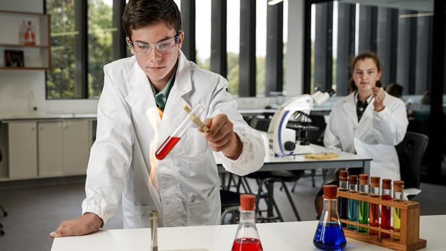 Angus and Sophie in the science lab. Picture: Mike Burton