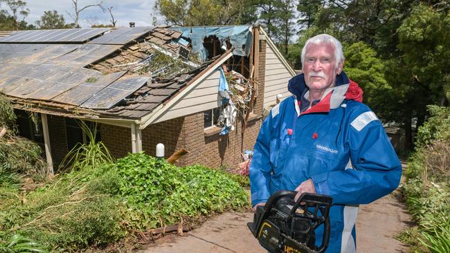 John Bryce outside the home he shares with his wife Marie – and was seriously damaged in the storm. Picture: Brenton Edwards