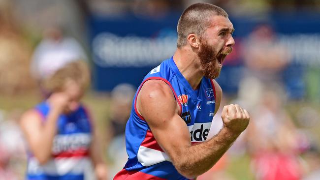 Dogs player Isaya McKenzie celebrates a goal in the drubbing of North Adelaide. Picture: Tom Huntley