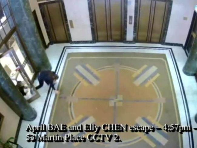 CCTV image showing Hostages Jieun ‘April’ Bae and Elly Chen escape from Man Haron Monis in the Lindt Cafe in Martin Place at 4:57pm. Picture: Supplied