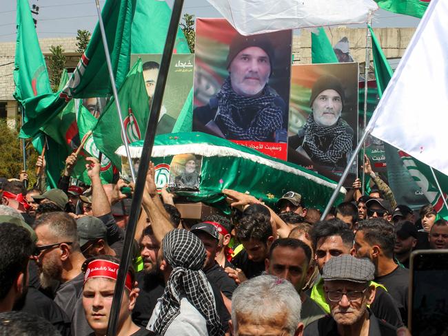Mourners carry the casket Shiite Amal movement commander Wassim Moussa, who was killed during an Israeli air strike in southern Lebanon. Picture: AFP