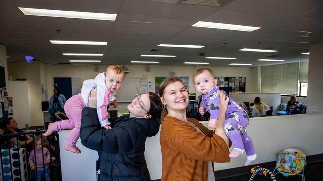 Christies Beach High School students Sophie with Ava, 11 months, and Savannah with, Harper, 8 months. Picture: Tom Huntley