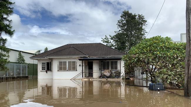 Flood water fills Ewing Street on March 1, 2022, a day after Lismore was hit by a record flood. Picture: Stuart Cumming