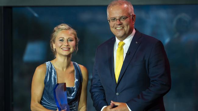 Prime Minister Scott Morrison with Australian of the Year Award winner and sexual abuse victims’ advocate Grace Tame. Picture: NCA NewsWire / Martin Ollman