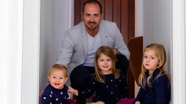 RealWay Toowoomba principal Cooper Watson, pictured with his daughters (from left) Ruby, Lily and Evie.