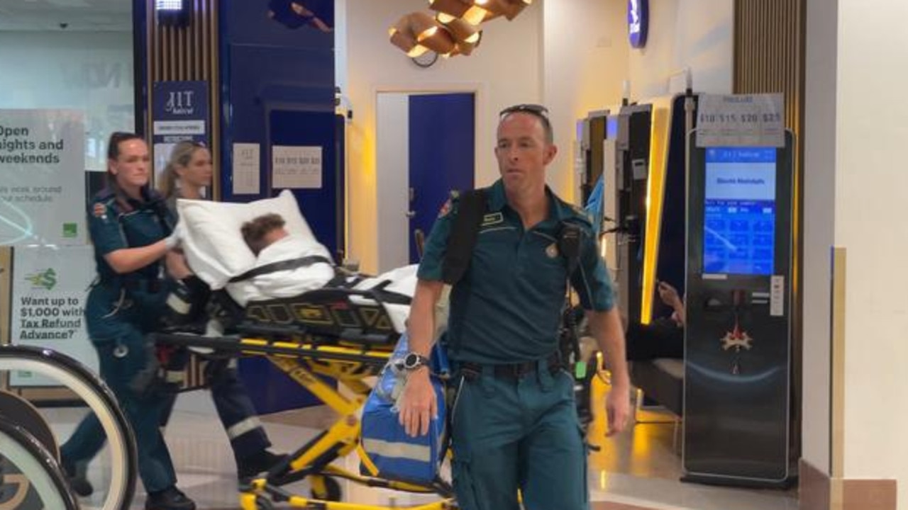 A man was allegedly stabbed at a popular shopping centre in Queensland.