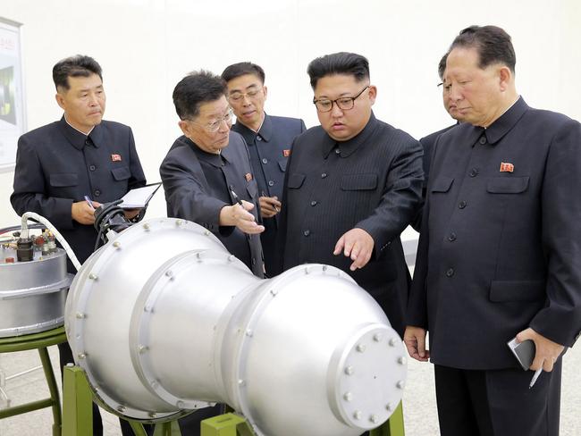 Pyongyang released pictures of North Korean leader Kim Jong-un with what state media said was a new type of hydrogen bomb. Picture: Korean Central News Agency/Korea News Service via AP