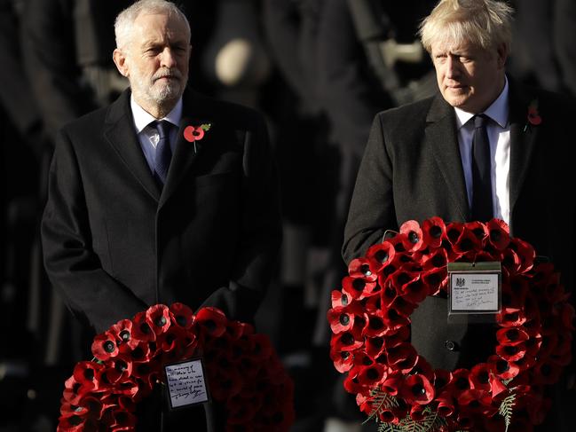 British Prime Minister Boris Johnson, right, and leader of the Labour Party Jeremy Corbyn prepare to lay wreaths during the Remembrance Sunday ceremony. Picture: AP