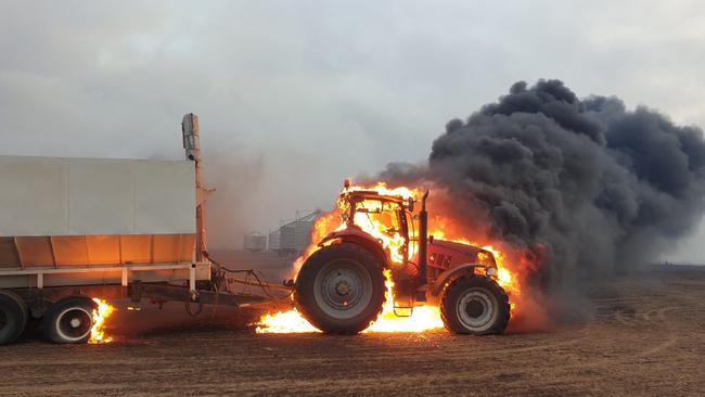 Machinery on fire from a bushfire outside of Edithburgh. Picture: Gabriel Polychronis