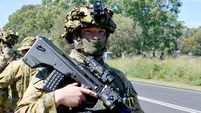 North Queensland Warfighter multi-nation military exercises hit the streets of Ingham. Lance Corporal Luke Podd from 1MP Battalion in Lucinda. Picture: Evan Morgan