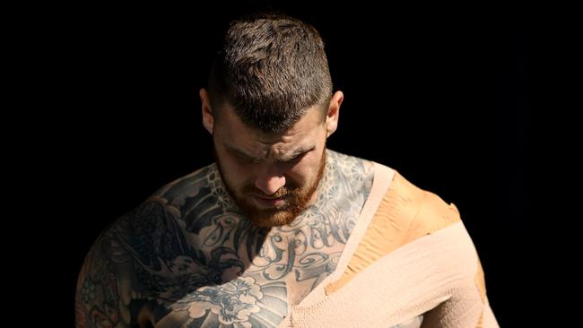 Is it the tattoos? Is it the bandages holding his body together? Josh Dugan ponders why he is in only 1% of teams. Picture: Mark Kolbe/Getty Images