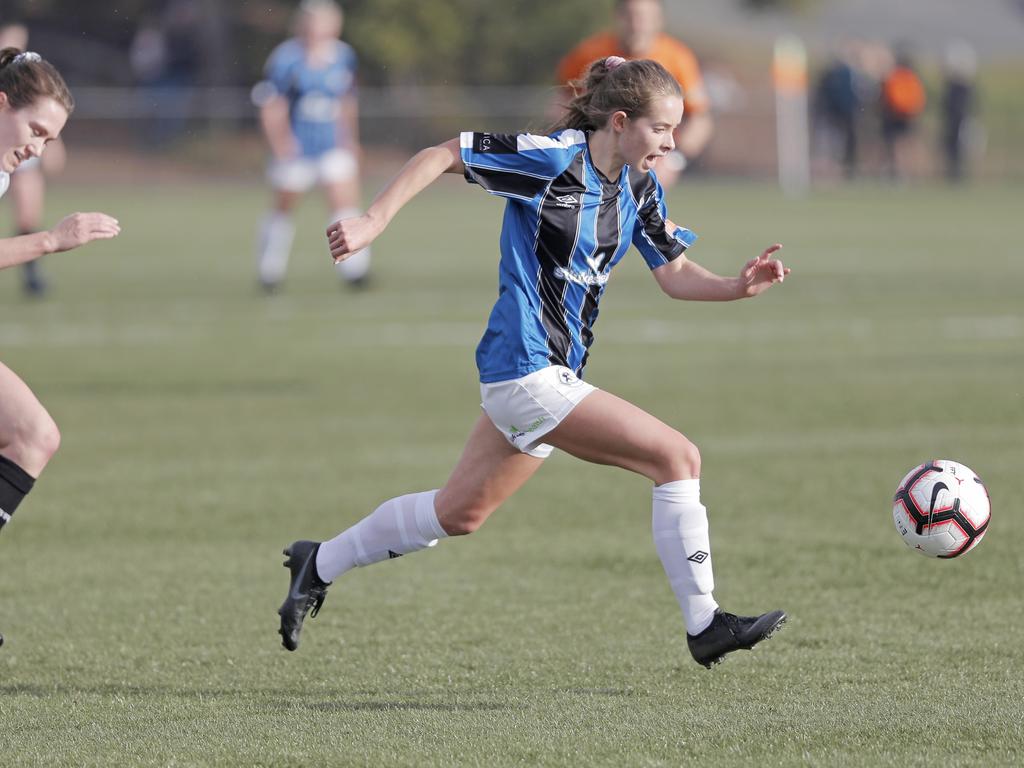 Hobart Zebras versus Kingborough Lions in the women's Statewide Cup final at KGV. Kingborough's Emille Tatton beats her opponent, Hobart's Rachel Gill. Picture: PATRICK GEE